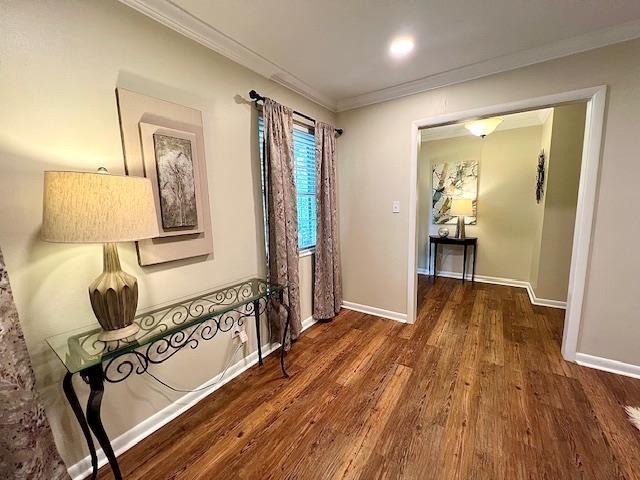 2401 Mexia Ave, Tallahassee, FL 32304 - corridor with crown molding, wood finished floors, and baseboards