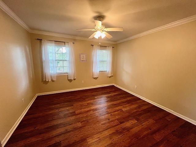 2401 Mexia Ave, Tallahassee, FL 32304 - empty room featuring dark wood-style floors, a ceiling fan, baseboards, and ornamental molding
