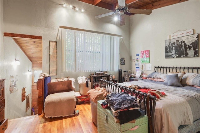 1292 Rumba Ln -, Unit Tallahassee, FL 32304 - bedroom with a wooden ceiling with exposed beams, wood finished floors, and a ceiling fan
