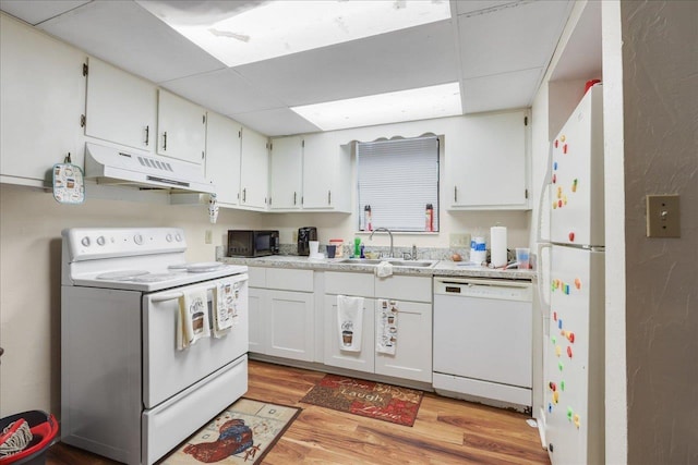 1292 Rumba Ln -, Unit Tallahassee, FL 32304 - kitchen featuring white appliances, under cabinet range hood, a drop ceiling, light wood finished floors, and light countertops