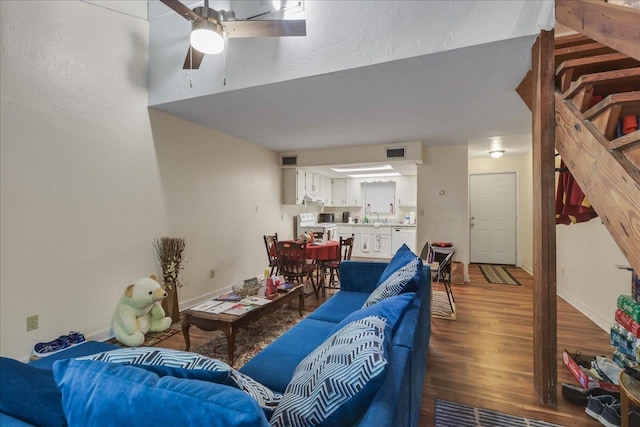1292 Rumba Ln -, Unit Tallahassee, FL 32304 - living area featuring wood finished floors, a ceiling fan, and stairs
