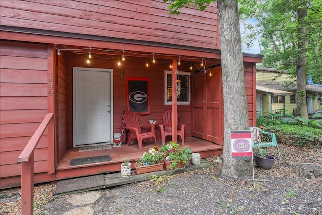 1292 Rumba Ln -, Unit Tallahassee, FL 32304 - doorway to property with covered porch