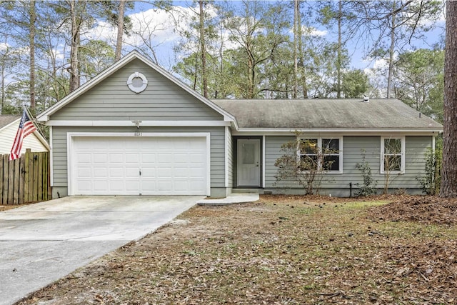 ranch-style house featuring a garage