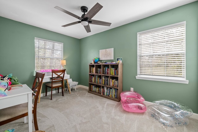 office space with ceiling fan, carpet, and baseboards