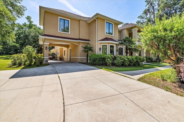 8017 Oak Grove Plantation Rd, Tallahassee, FL 32312 - view of front facade featuring stucco siding and concrete driveway