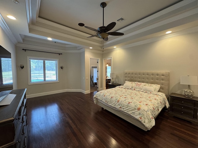 8017 Oak Grove Plantation Rd, Tallahassee, FL 32312 - bedroom featuring a raised ceiling, dark wood finished floors, baseboards, ornamental molding, and ceiling fan
