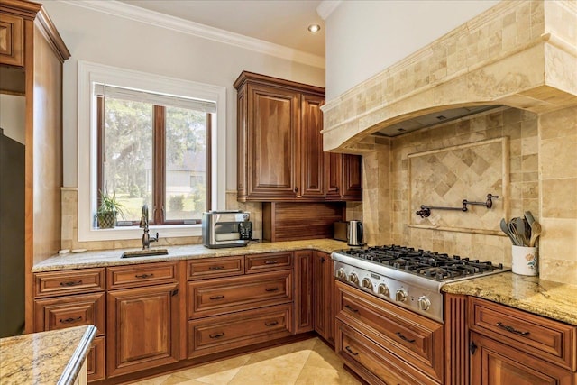 8017 Oak Grove Plantation Rd, Tallahassee, FL 32312 - kitchen with a sink, stainless steel gas stovetop, premium range hood, tasteful backsplash, and light stone countertops