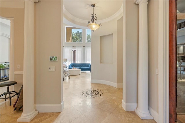 8017 Oak Grove Plantation Rd, Tallahassee, FL 32312 - corridor with baseboards, a high ceiling, ornate columns, and light tile patterned floors