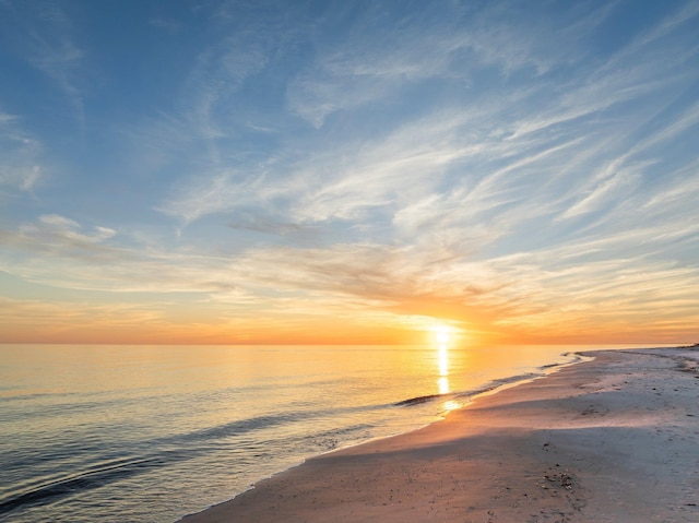 property view of water featuring a beach view