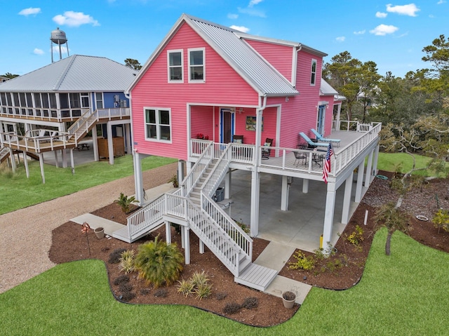 view of front of home featuring a carport and a porch