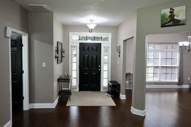 325 Mine Rd, Midway, FL 32343 - entryway with hardwood / wood-style flooring, healthy amount of natural light, and a chandelier