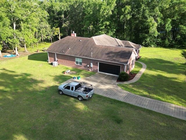 325 Mine Rd, Midway, FL 32343 - aerial view of property and surrounding area with a heavily wooded area