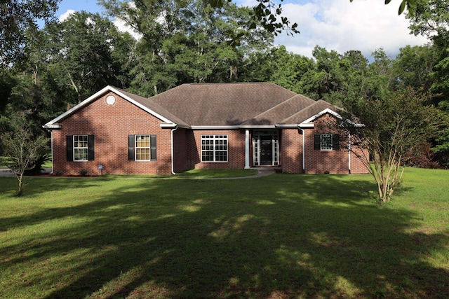 325 Mine Rd, Midway, FL 32343 - ranch-style home featuring brick siding and a front yard