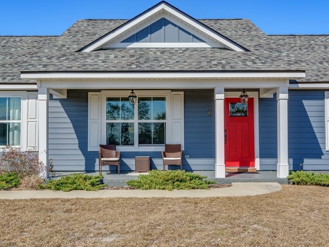 entrance to property featuring a porch