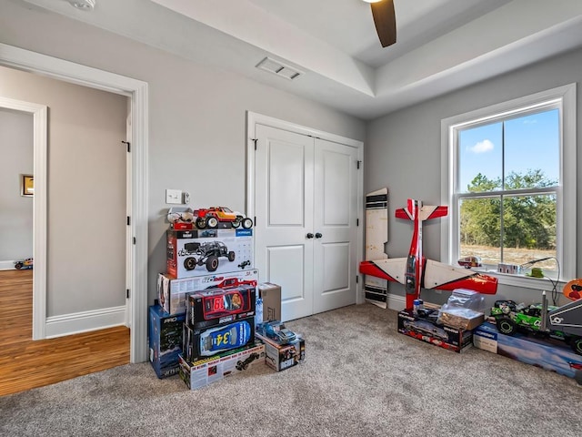 game room featuring ceiling fan and carpet flooring