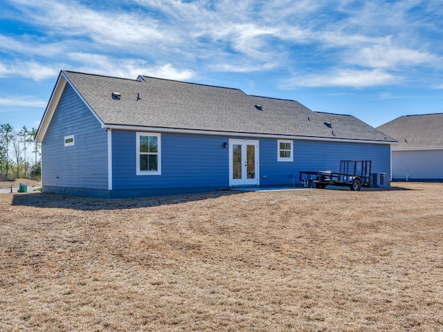 back of house featuring a patio area and french doors