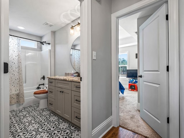 full bathroom with vanity, toilet, and shower / bathtub combination with curtain