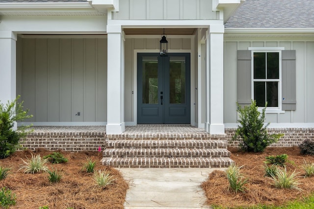 property entrance featuring french doors