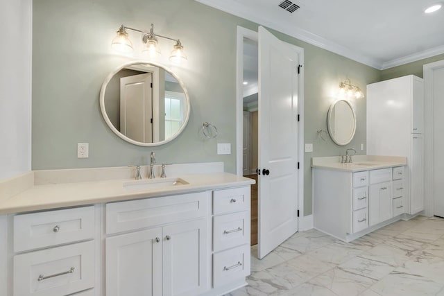 bathroom featuring ornamental molding and vanity