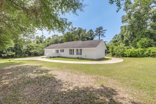 4545 Thomasville Rd, Tallahassee, FL 32309 - view of front of home with a front lawn, cooling unit, and concrete driveway
