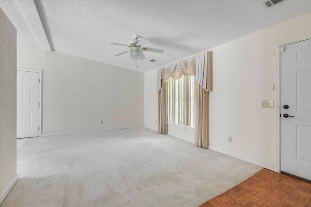 4545 Thomasville Rd, Tallahassee, FL 32309 - empty room featuring ceiling fan, a textured ceiling, carpet flooring, and baseboards