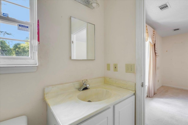 4545 Thomasville Rd, Tallahassee, FL 32309 - half bathroom featuring vanity and toilet