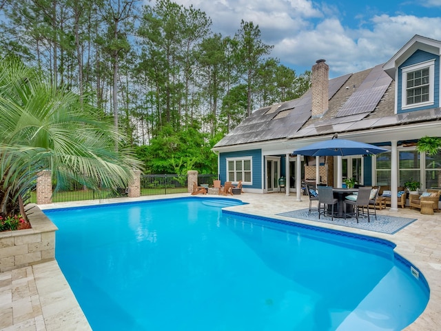 view of pool featuring a patio area