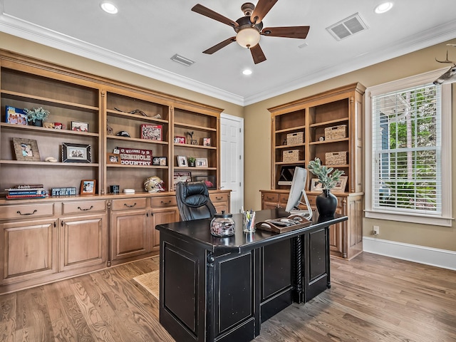 office area with ceiling fan, light hardwood / wood-style flooring, and crown molding