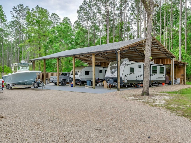 view of parking with a carport