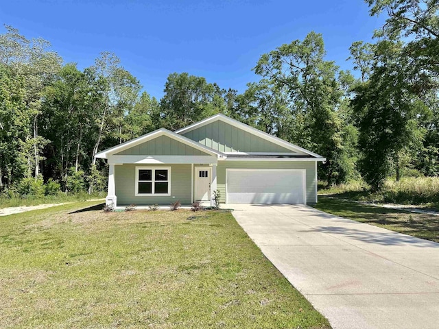 view of front of home featuring driveway, a garage, a front lawn, and board and batten siding