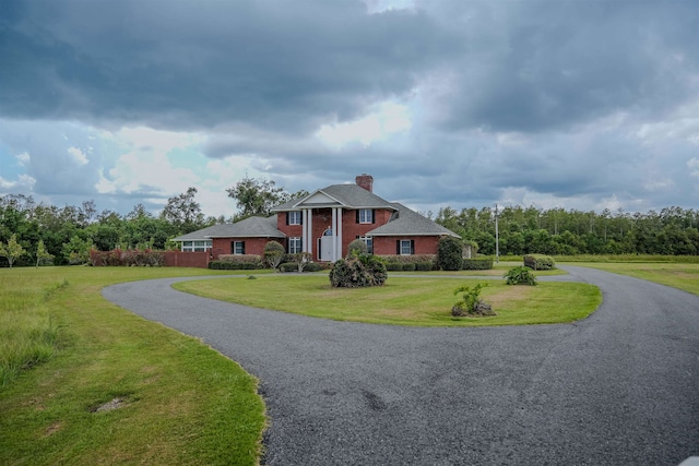 view of front of property with a front lawn