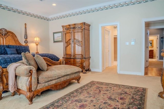 carpeted bedroom with ornamental molding