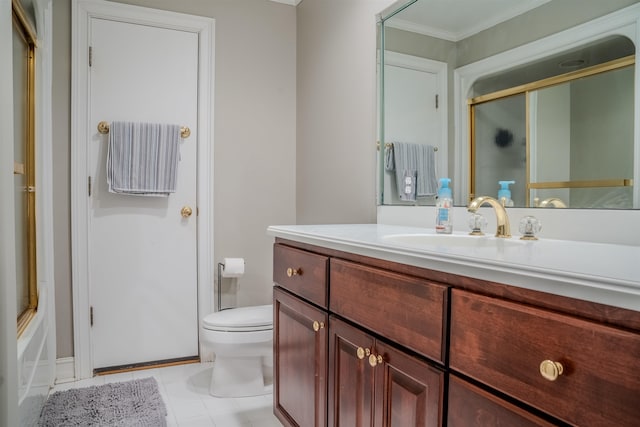 full bathroom featuring shower / bath combination with glass door, tile patterned floors, ornamental molding, vanity, and toilet