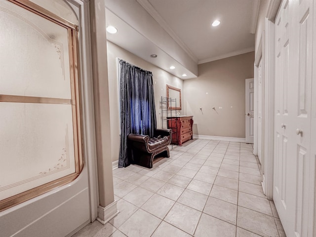 bathroom with a shower, vanity, tile patterned floors, and ornamental molding