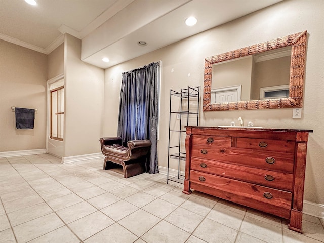 bathroom with vanity, tile patterned floors, and crown molding