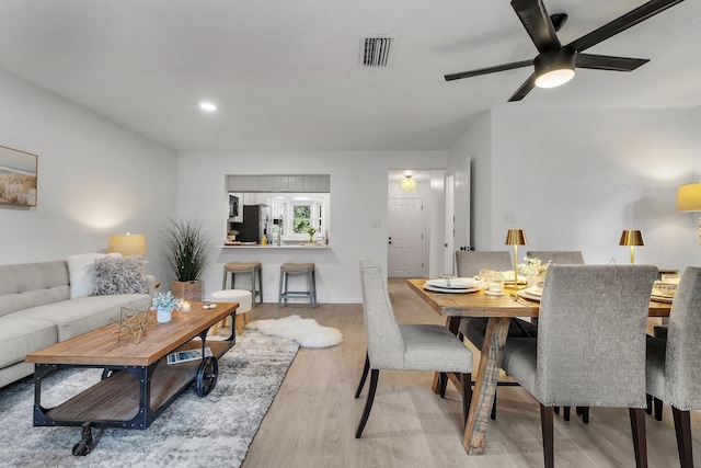 interior space featuring ceiling fan and light hardwood / wood-style flooring