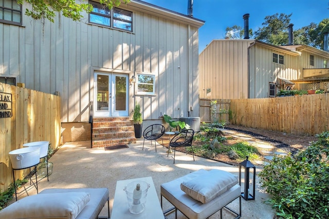 rear view of property featuring a patio