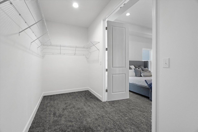 5756 Bascom Ln, Tallahassee, FL 32309 - walk in closet featuring dark colored carpet