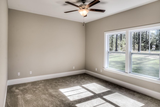 carpeted empty room with ceiling fan