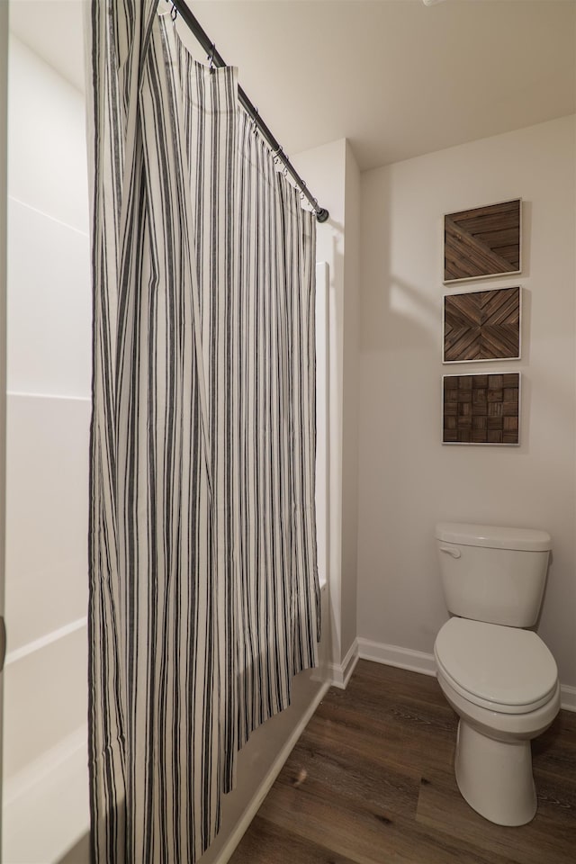2986 Ervine St, Tallahassee, FL 32308 - full bathroom with shower / bath combination with curtain and wood finished floors
