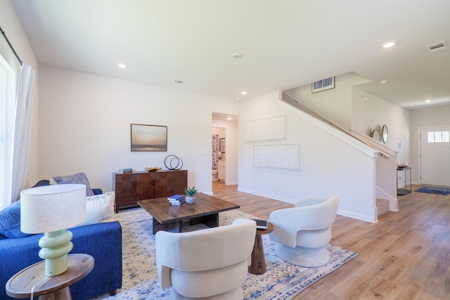 2986 Ervine St, Tallahassee, FL 32308 - living area with stairs, light wood-type flooring, and recessed lighting