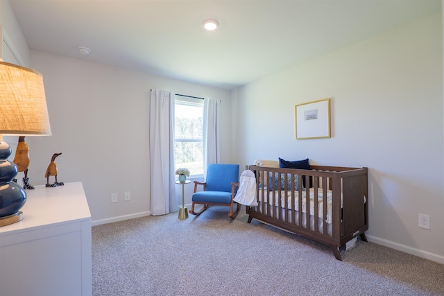 2986 Ervine St, Tallahassee, FL 32308 - bedroom featuring carpet flooring and a crib