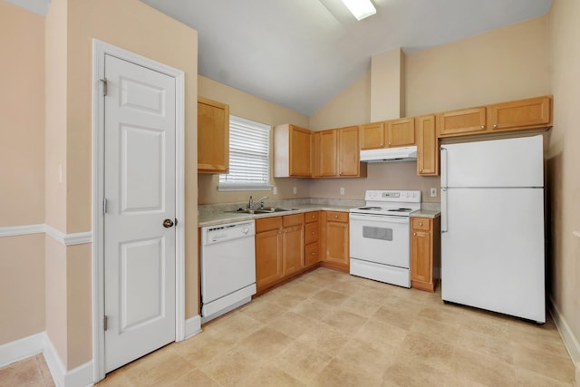 kitchen featuring lofted ceiling, sink, white appliances, and light brown cabinets