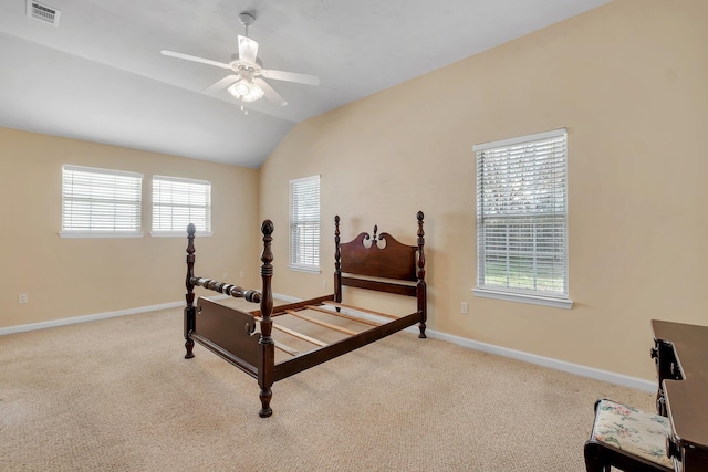 carpeted bedroom featuring ceiling fan and lofted ceiling