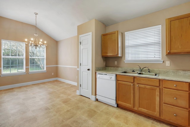 kitchen with lofted ceiling, sink, an inviting chandelier, decorative light fixtures, and dishwasher