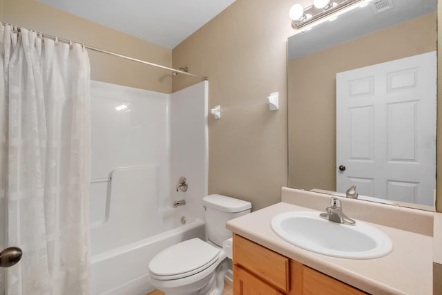 full bathroom featuring vanity, toilet, and shower / bath combo with shower curtain