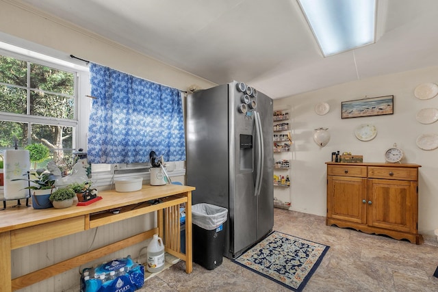 kitchen with stainless steel fridge with ice dispenser