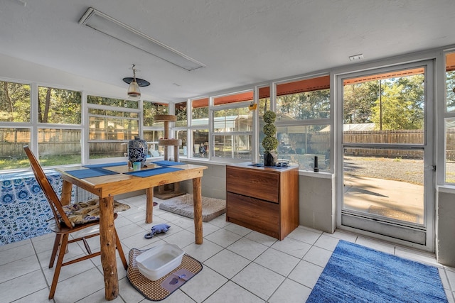 sunroom / solarium with lofted ceiling