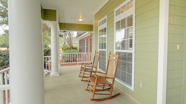 balcony featuring a porch