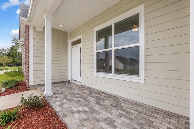 property entrance with a patio